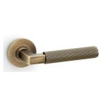 Alexander & Wilks AW202AB Hurricane Reeded Lever On Round Rose - Antique Brass (LEAD TIME: 2-3 DAYS)